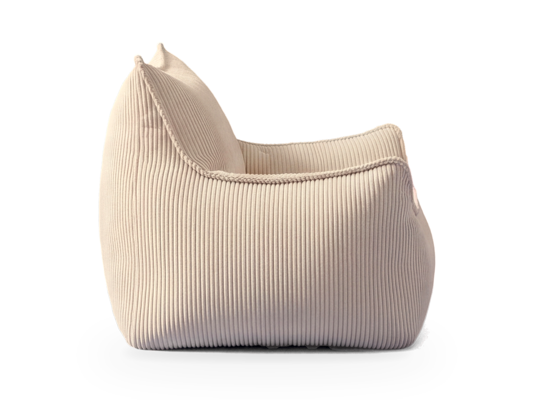 Pouf fauteuil en velours côtelé écru vu de profil