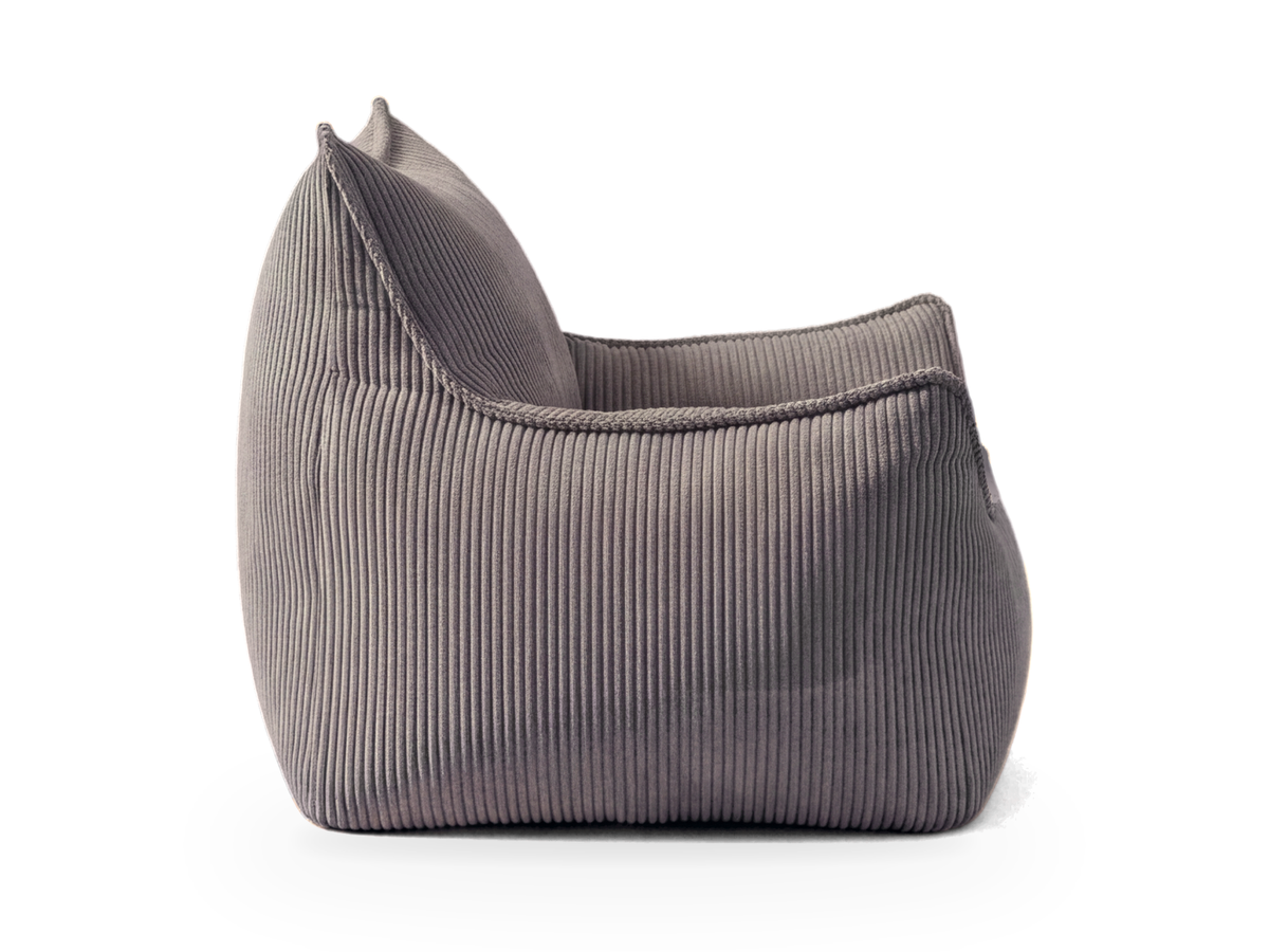 Pouf fauteuil en velours côtelé gris vu de profil