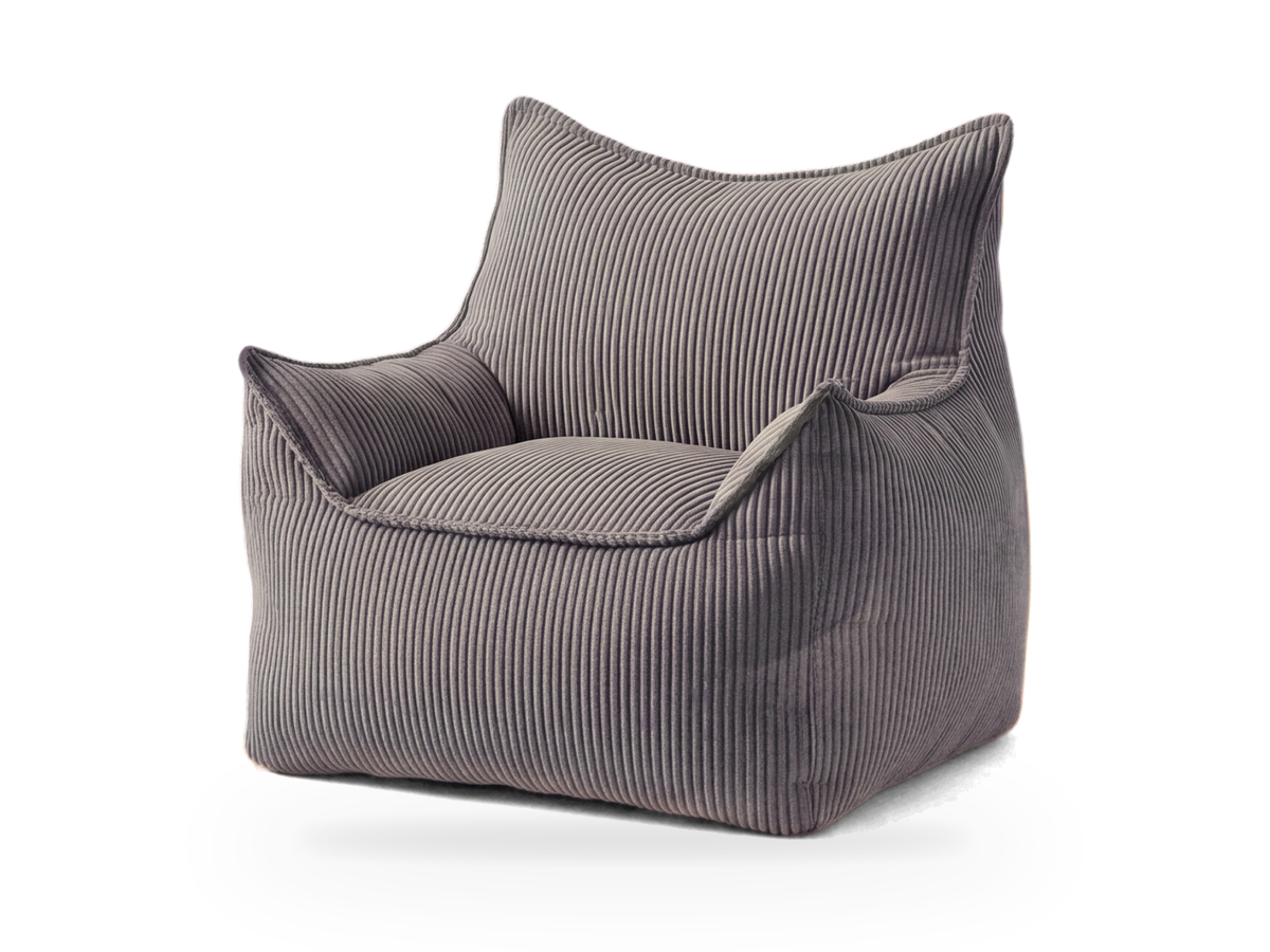 Pouf fauteuil gris en velours côtelé vu de trois quarts, assise au sol sans pieds